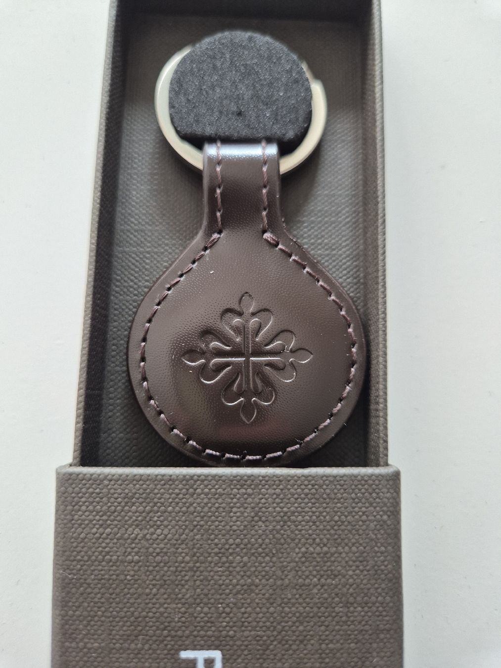 Patek Philippe Portachiavi: patek philippe porte clefs – Nuovo e nell'imballaggio originale da Genève venduto da Jouyt
