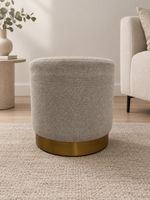 Pouf mit goldenem Detail