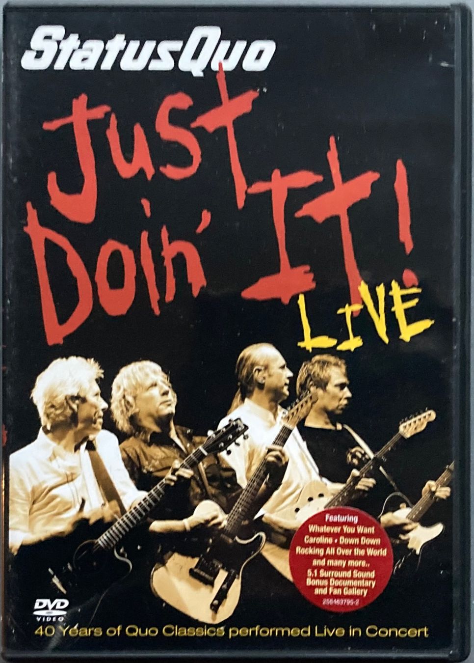 Tous les DVDs: STATUS QUO - JUST DOIN' IT LIVE – D'occasion à Poliez-Pittet par Newtown-Records