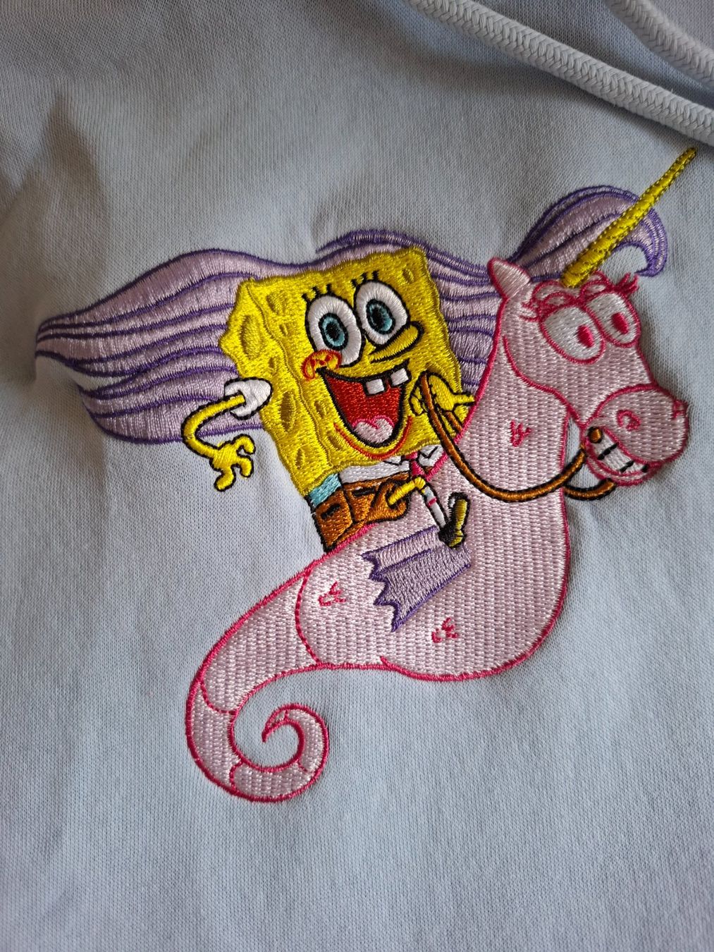 H&M Pullover & Sweatshirts: Hoodie Divided Spongebob Einhorn hellblau Grösse L – Gebraucht aus Bäretswil von mickey100 5