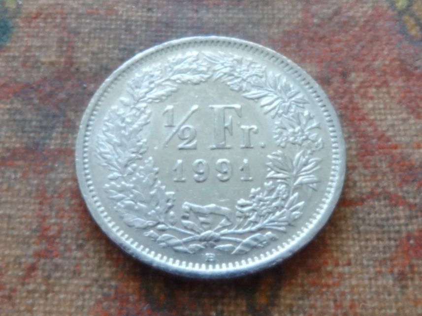 Tutti le monete: 1/2 Fr. 1991 – Usato da Romanel-sur-Lausanne venduto da Swift13