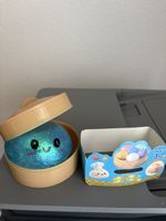 Squeezy Dumpling Spielzeug blau mit Dose guter Zustand