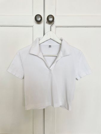 Polo blanc en coton femme Uniqlo, coupe courte - Taille M
