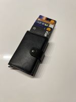 Mini Portemonnaie in schwarzer Ausführung mit Druckknopf