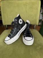 Schwarze Leder Converse mit Plateau in Grösse 38