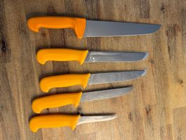 5 scharfe Metzgermessersets, orange Griffe, Top Zustand!