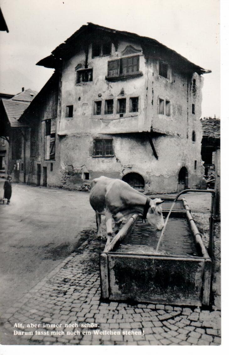Cartoline postali: Turtmann Walliserhaus und Kuh am Brunnen – Usato da Wolhusen venduto da Curver9