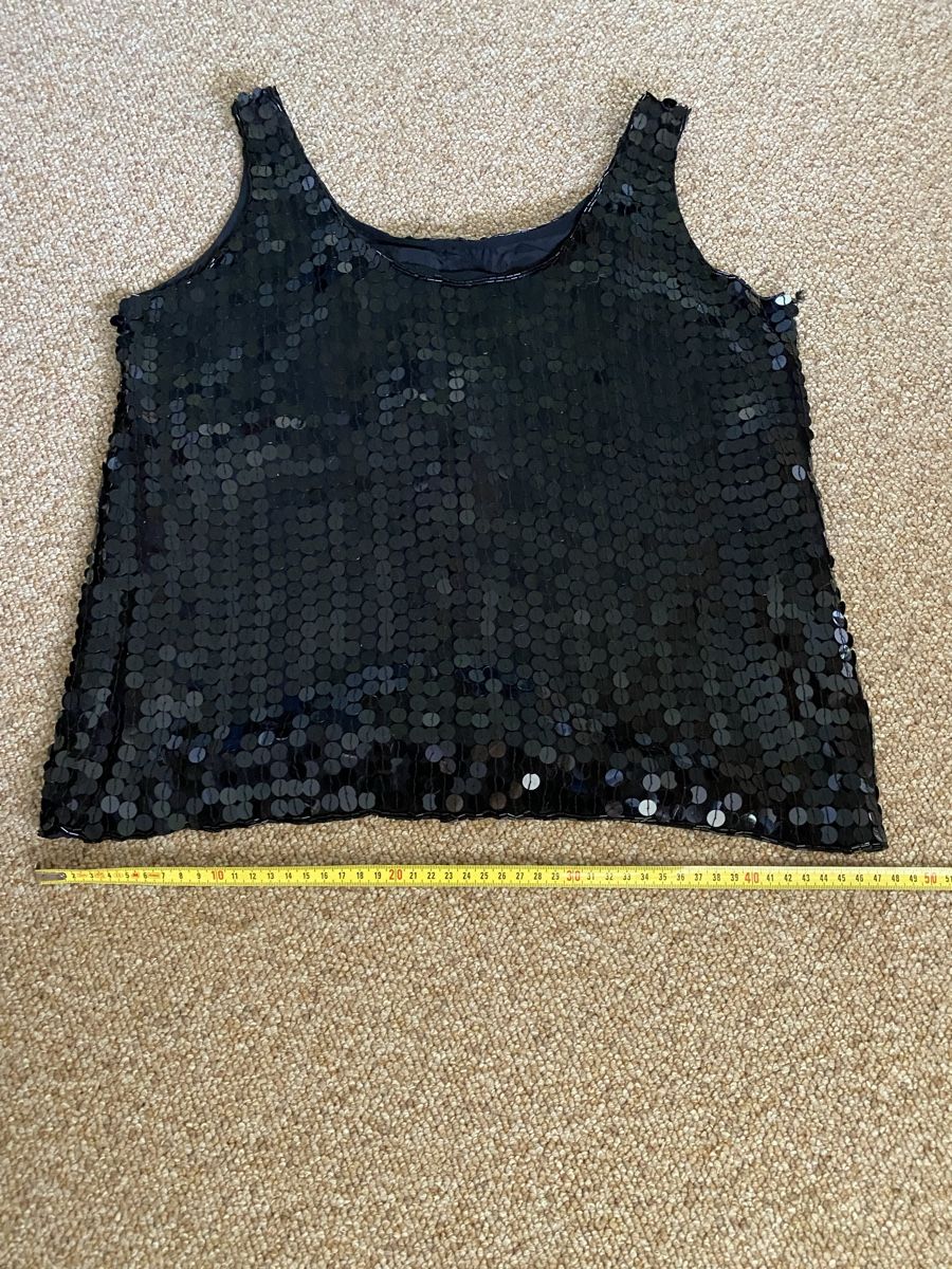Top: Top noir paillettes taille 36 – Usato da Küssnacht am Rigi venduto da CALIFRASQUI 1