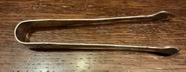 Pince à sucre en argent 800, poids 20 g