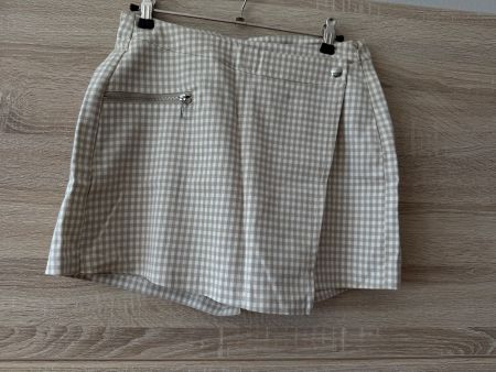 Jupe short beige à carreaux