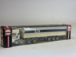 VE1- Herpa Volvo F 12 NTS Pritschensattelzug