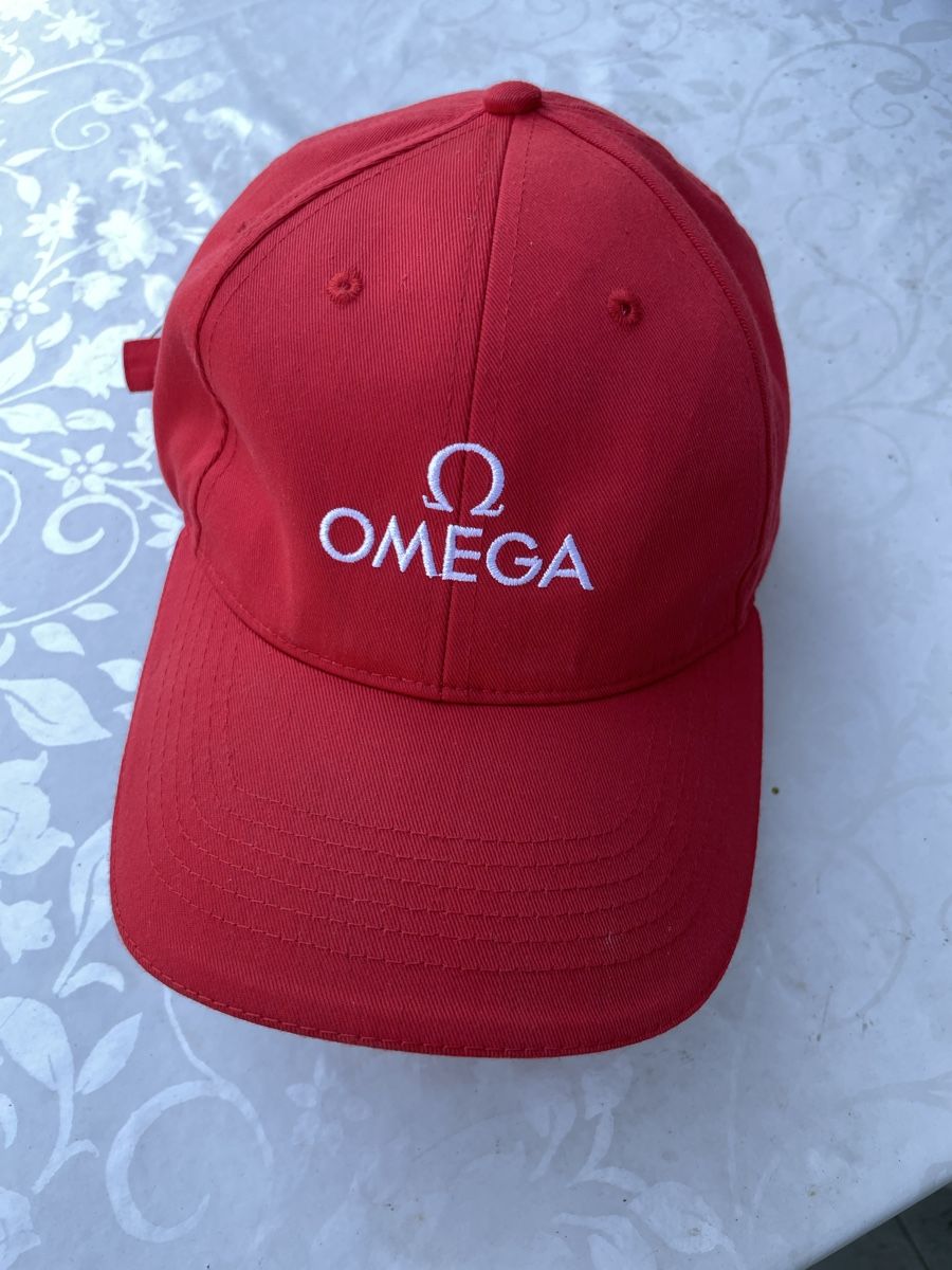 Copricapi, berretti & cappellini: Casquette Oméga rouge – Usato da Biel/Bienne venduto da Galaq 3