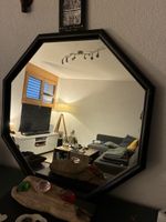 Miroir octogonal cadre noir en bon état général