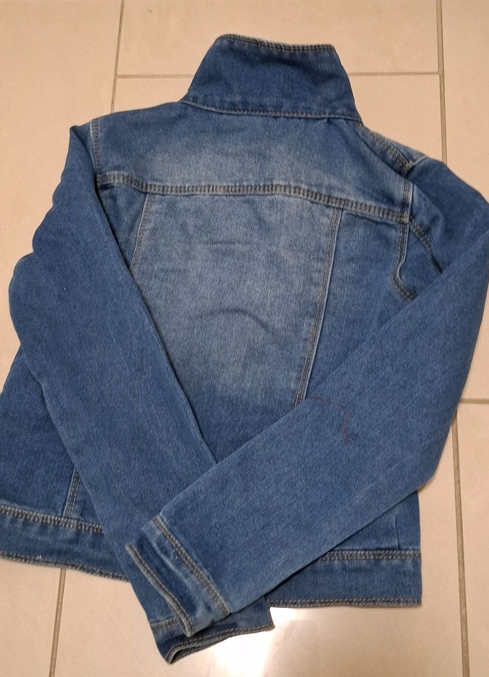Name It Giacche & Cappotti: Jeansjacke Mädchen name it 128 – Usato da Richterswil venduto da Palmer2012 1