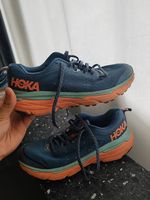 Hoka running shoes size on the pics 