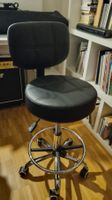 Tabouret de travail à roulettes