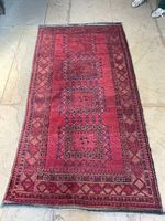 Tapis grenat géométrique  112 × 204  excellent état