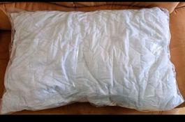 traversin blanc  confortable emballé pour une nuit paisible
