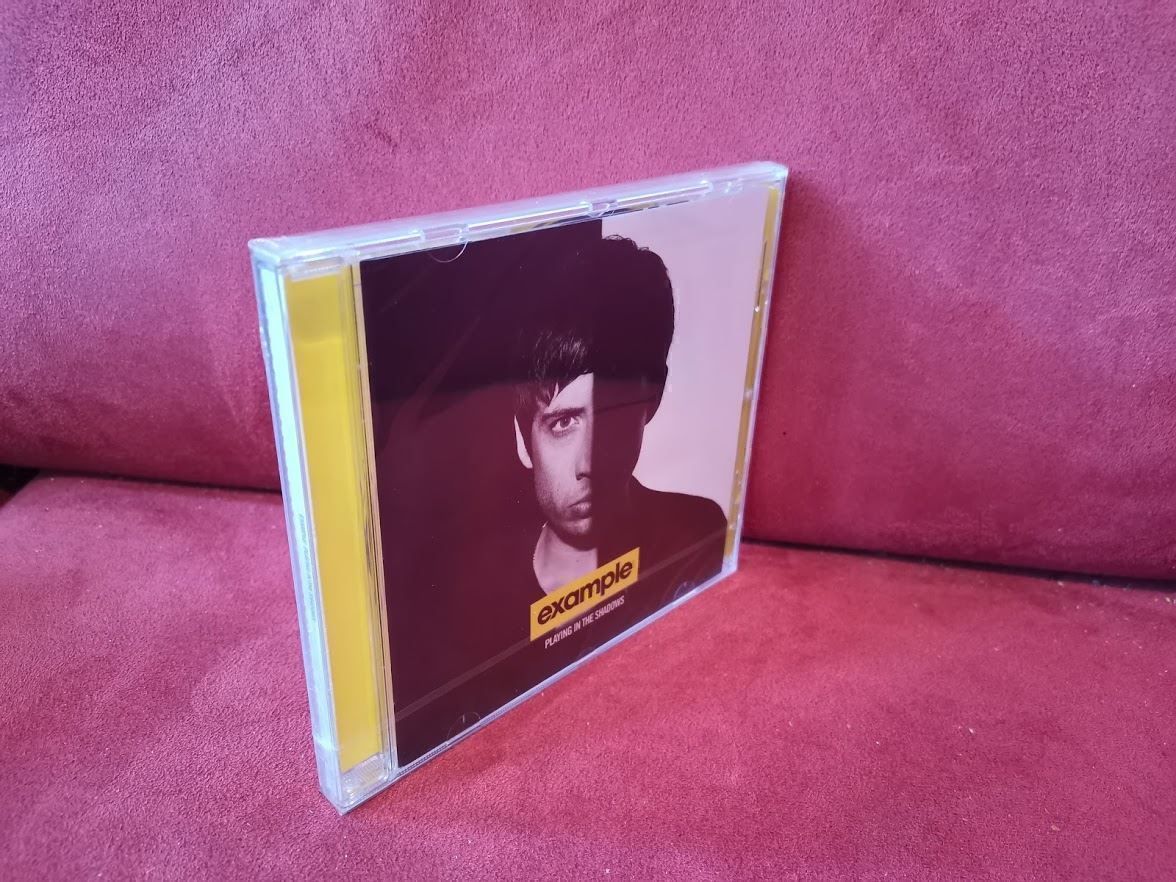 CDs: Example Playing in the Shadows – Neu (gemäss Beschreibung) aus Zofingen von noise123 3