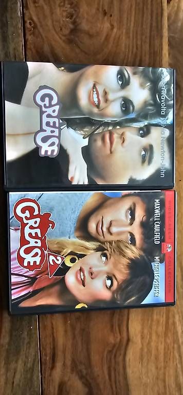 Alle DVDs: 2 DVD Grease – Gebraucht aus Appenzell von San-cu