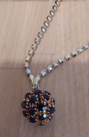 Collier avec boule sertie de grenats