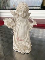 Engel mit Blume Blumenengel 15cm Kunstharz