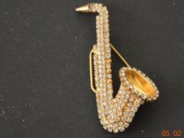 Strass Brosche Saxofon Gold
