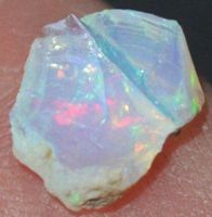 Edelstein L-7650 – Äthiopischer Opal roh 9,5x8mm 1.20 Karat