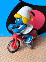 Schlumpfine auf Fahrrad