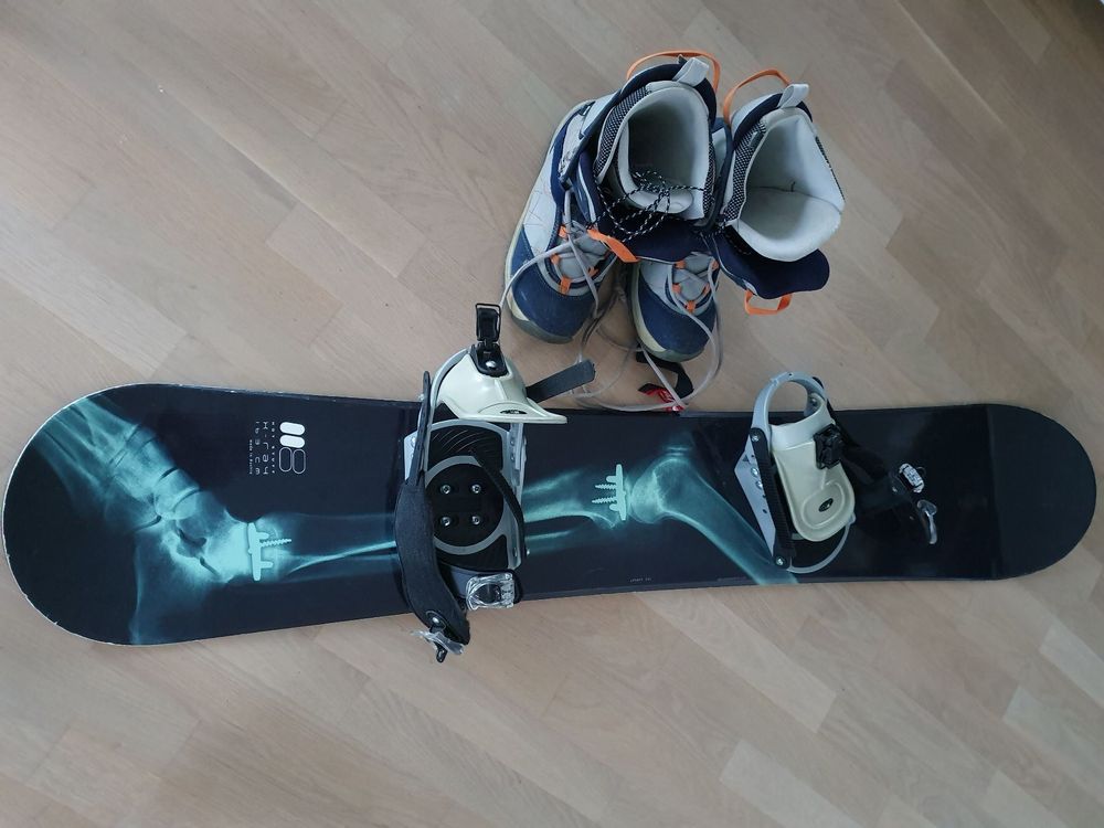 Used snowboard with shoes Kaufen auf Ricardo