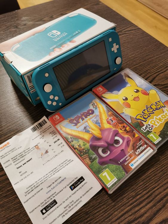 Nintendo switch Lite + 2 games,, | Kaufen auf Ricardo