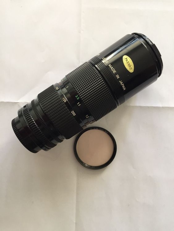 Canon Zoom Objektiv + Filter Kaufen auf Ricardo
