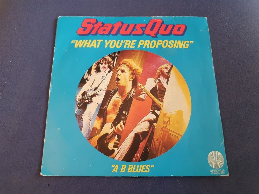 STATUS QUO, What you're proposing Si TOP Kaufen auf Ricardo