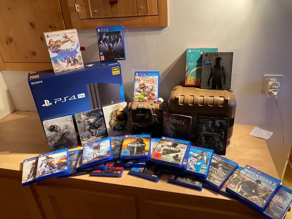 PlayStation 4 Pro (2019) plus 30 Games Kaufen auf Ricardo