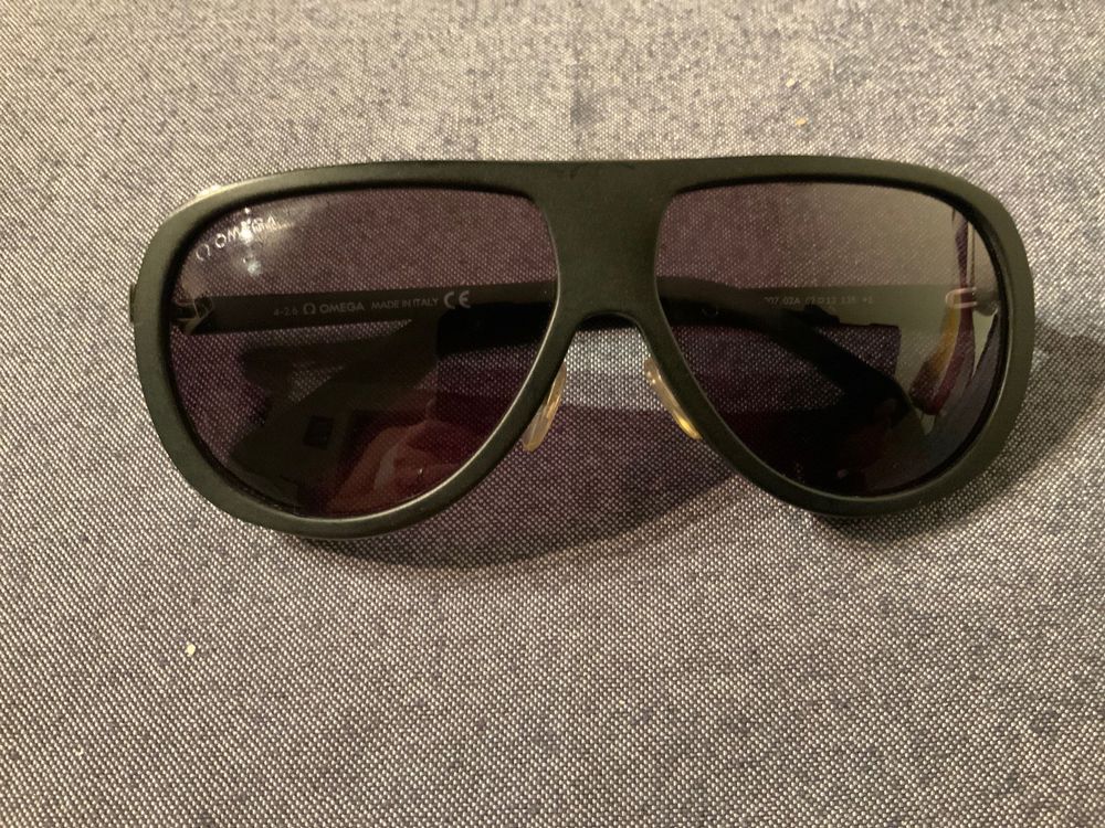Sonnenbrillen Omega Herren Sonnenbrille OMEGA schwarz Herren Accessoires Omega Herren Sonnenbrillen Omega Herren 