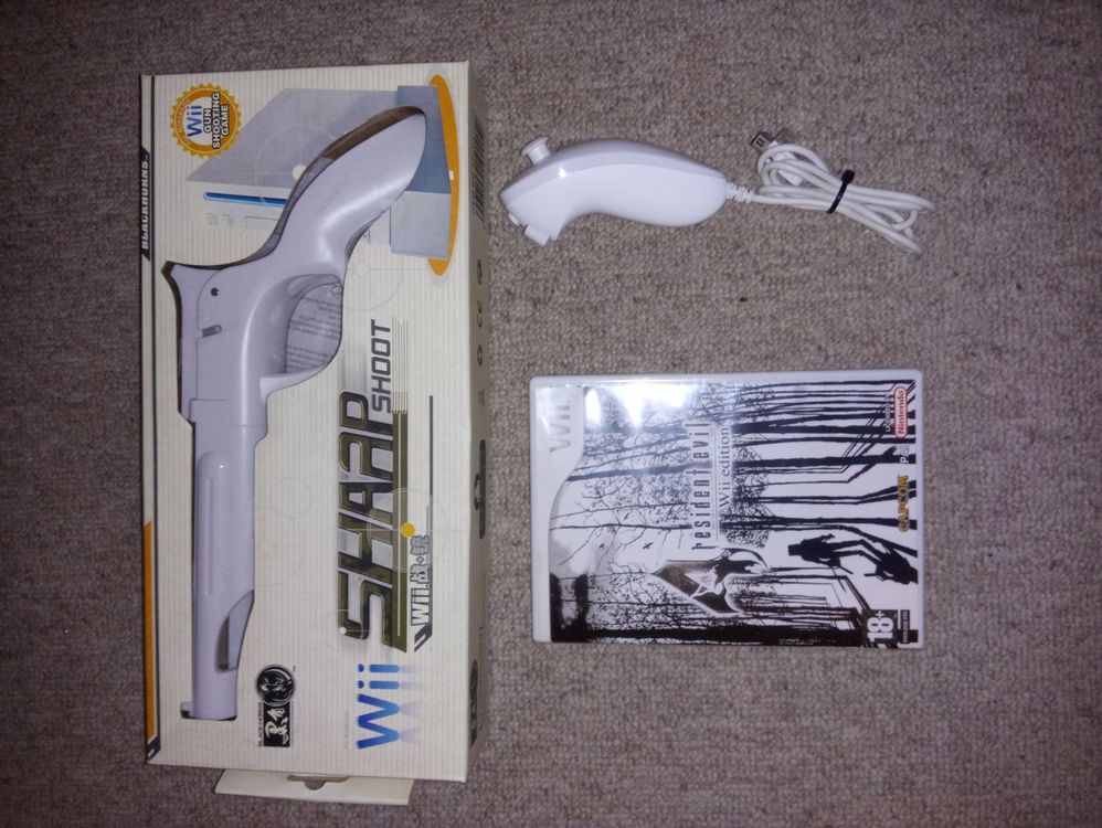 Nintendo Wii Resident Evil 4 mit Gun Acheter sur Ricardo