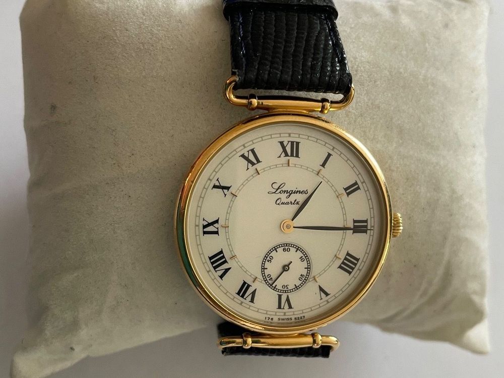 LONGINES Montre bracelet d'homme en plaqué or et acier. Le cadran octogonal  à [] | lot 80 | Tableaux, Bijoux, Mobilier et Objets d'Art, Art Océanien  chez Hôtel des Ventes Giraudeau | Auction.fr