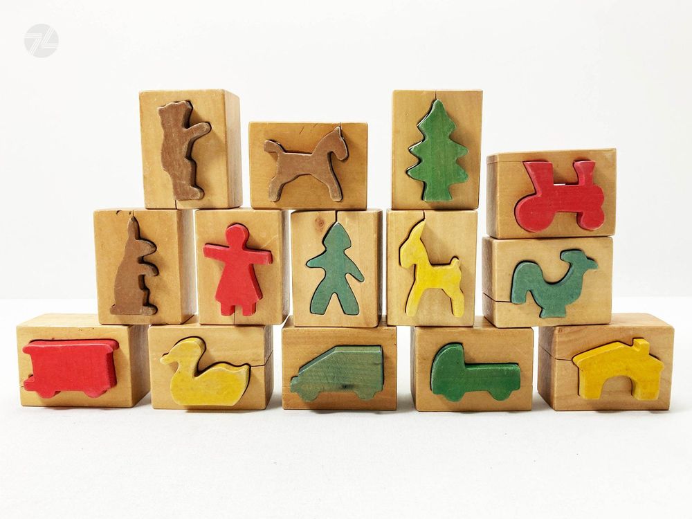 Holz-Puzzle Figuren im Stil von Naef Vitali Franz Carl Weber 1