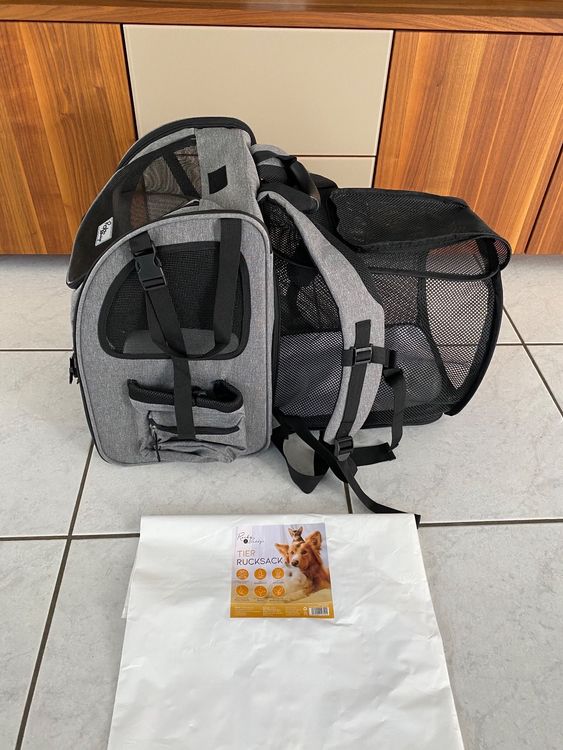 Produktbild von Rocky&Buddy's Faltbarer Hunderucksack Katzenrucksack [max.10kg] - Rundum Atmungsaktiver Rucksack Hund - Katzenbox Transportbox - Inkl. Sicherheitsleine, Regenschutz & Trinknapf - Schadstofffrei