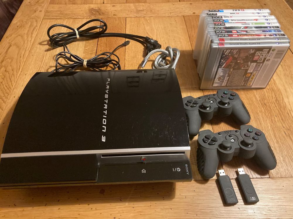 PS3 mit 14 Spielen und 2 Controller Kaufen auf Ricardo