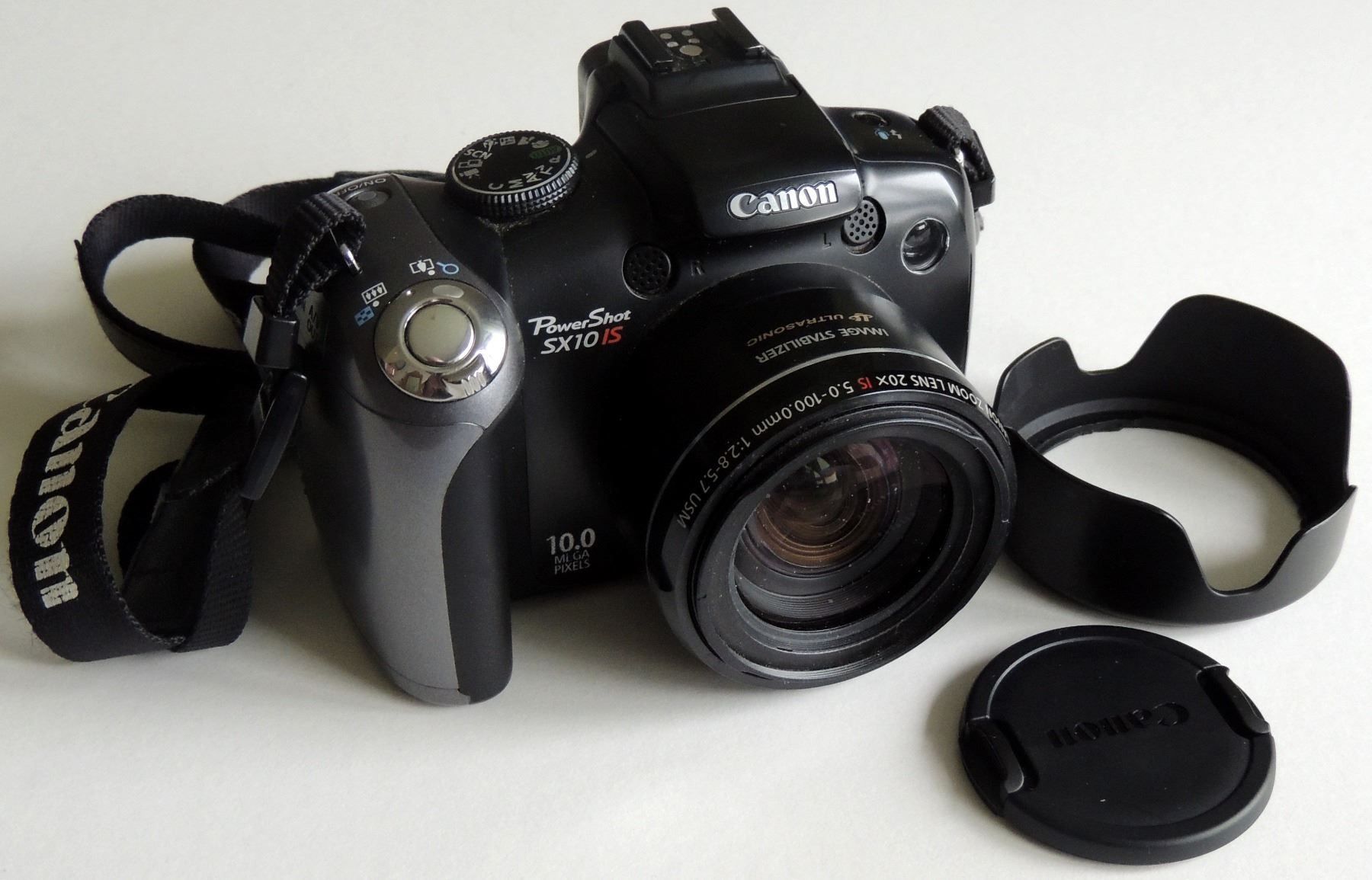 Canon PowerShot SX10 IS, Digital Kamera acheter sur Ricardo