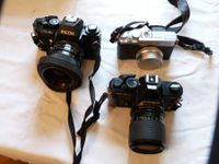 3 antike Kameras