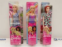 3x Barbiepuppen
